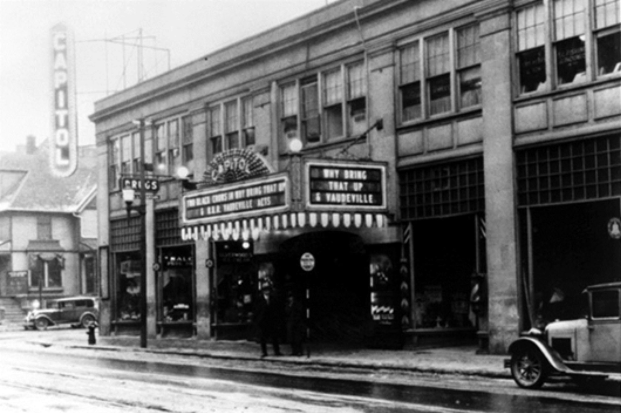 Black and white photo of theatre facade. Oldest photo of the Capitol theatre.